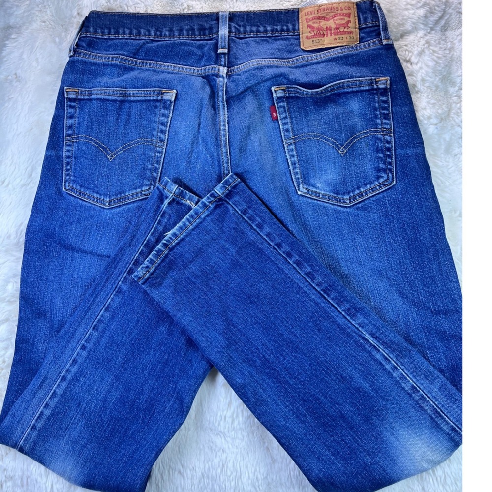 Levis 513 Slim Straight Jeans Mens 33x30 Blue Medium Wash Distressed Denim. A42